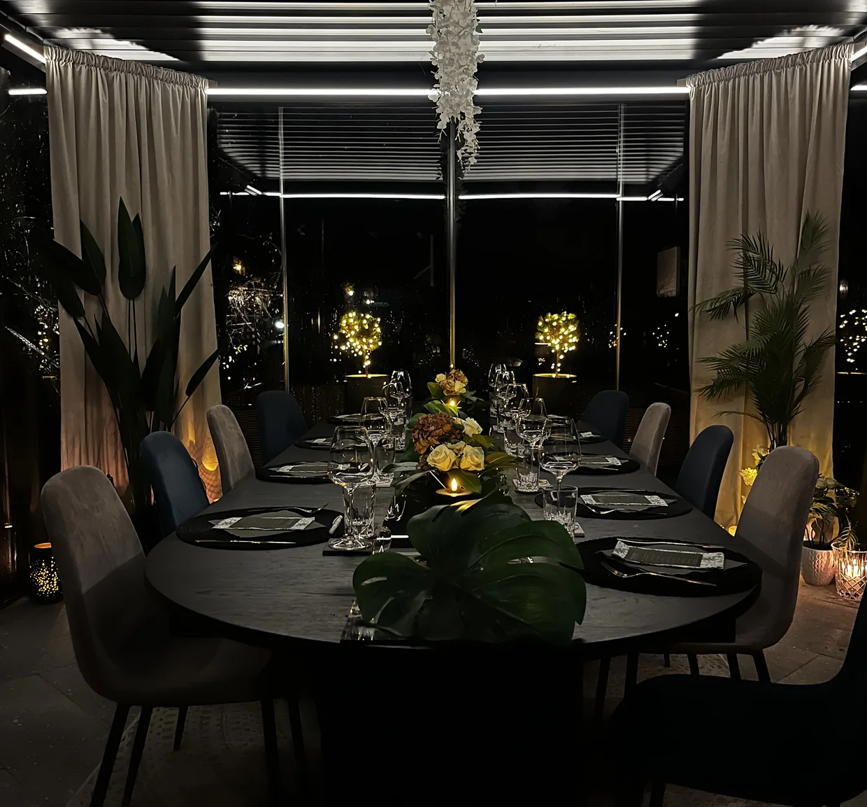 The showroom at night, the table laid