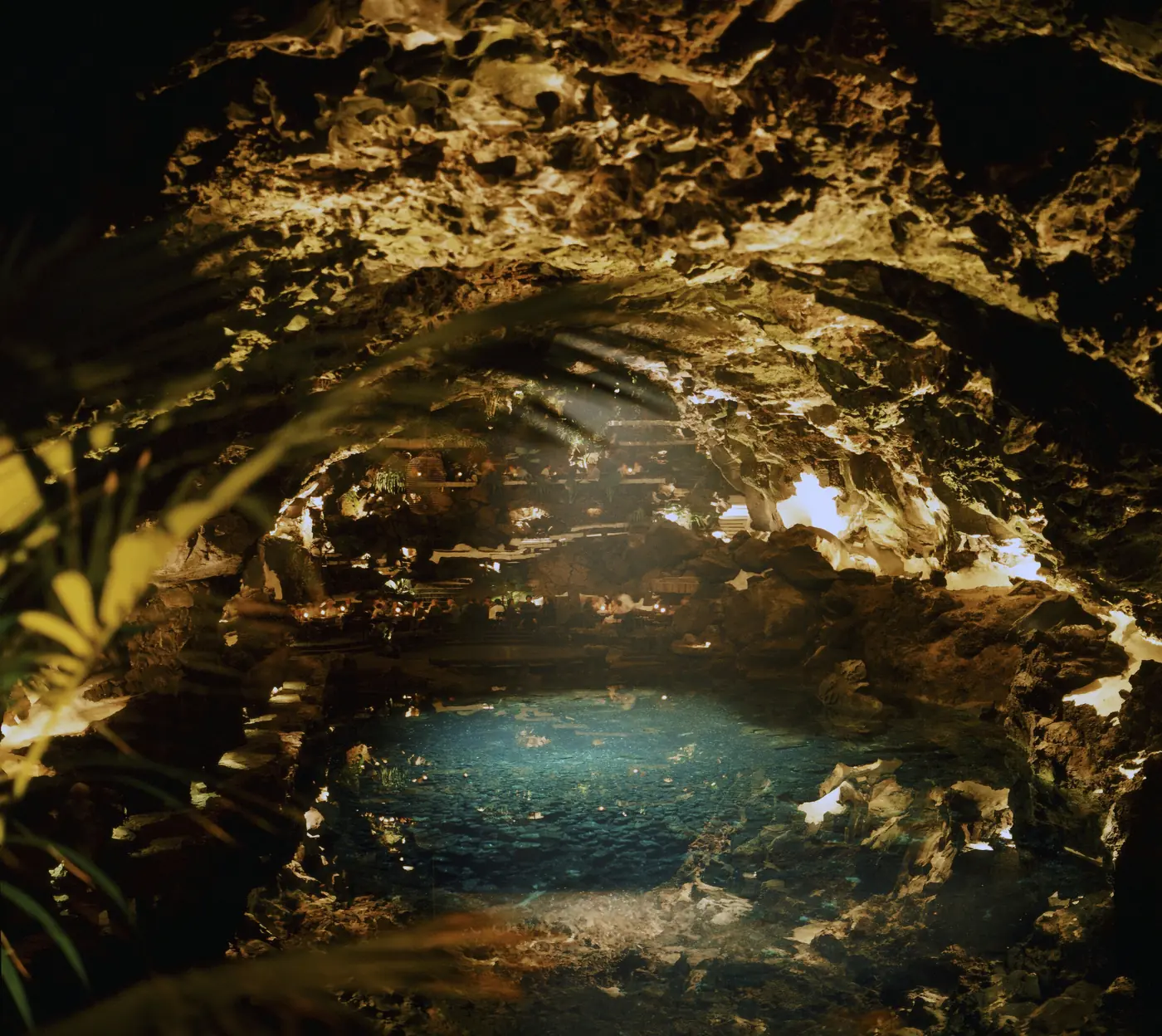 Turquoise pool inside a lava tunnel