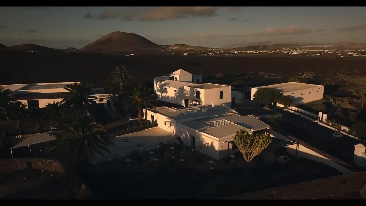 El Grifo’s bodega at dusk, the volcano behind